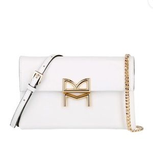 Excellent condition Bruno Magli white strap bag.